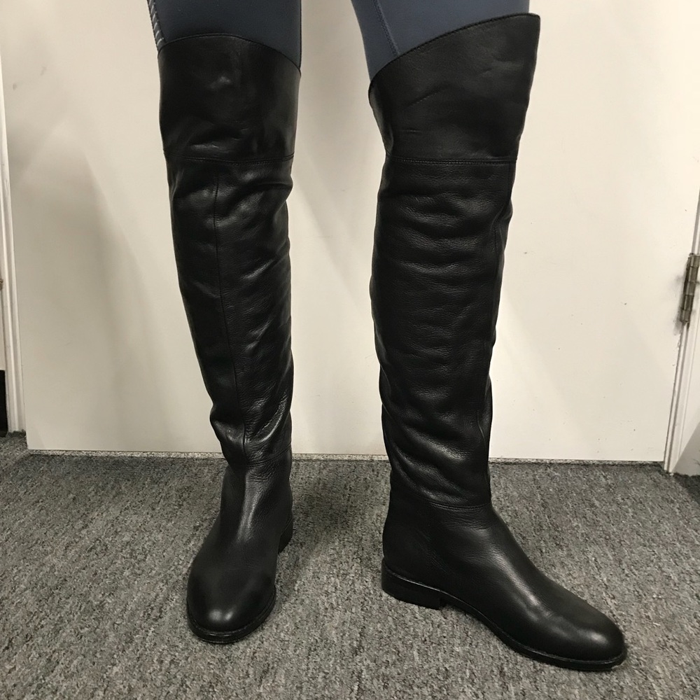 Black knee high riding boot